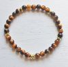 Armband 6mm bruine Tijgeroog kralen met goudplated hematiet, 20cm