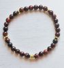 Armband 6mm rode tijgeroog kralen met goudplated hematiet, 20cm