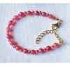 Armband 6mm zacht roze-rode jade kralen