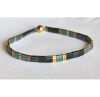 Armband Miyuki tila kralen in zwart, goud en metallic blauw-groen