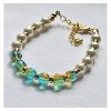 Armband 8mm satijnwitte glasparels en aquamarijn kleur kralen
