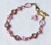 Armband roze bloem kralen en facetgeslepen kralen