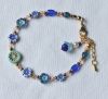 Armband blauwe bloem en facetgeslepen glaskralen