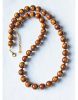Ketting goud-bruin gevlamde 12mm resin kralen, 53cm