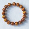 Armband 12mm bruin-geel gevlamde resin kralen, 20cm