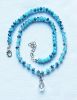 Ketting facetgeslepen blauwe kralen met druppel kristal hanger
