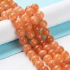 Half snoer 8mm jade koraal oranje, gemiddeld 22-24 kralen per snoer